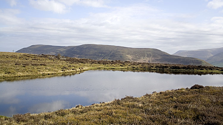 Lake on Pen Tir with Mynydd Troed beyond