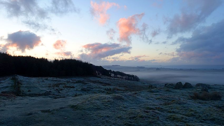 Dawn sky and frozen landscape at Milecastle 44