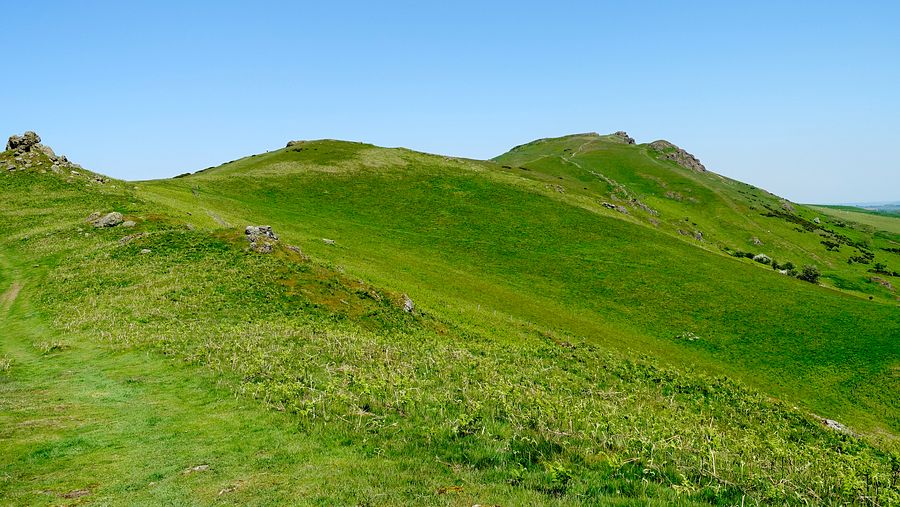View ahead to Three Fingers Rock and Caer Caradoc tops View ahead to Three Fingers Rock and Caer Caradoc tops