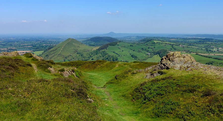 View from Caer Caradoc rampart to The Lawley and distant Wrekin View from Caer Caradoc rampart to The Lawley and distant Wrekin