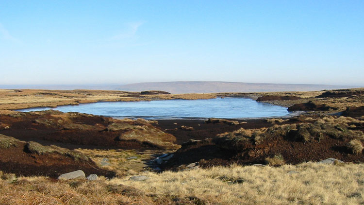 Moorland peat & nameless pool on Birks Fell ridge