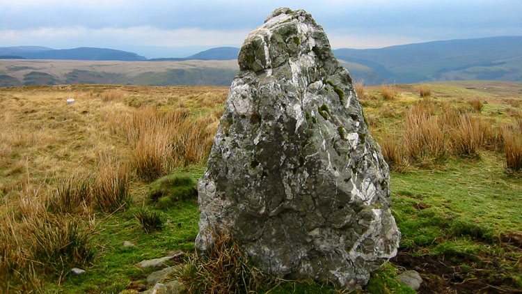 Standing stone on lower top