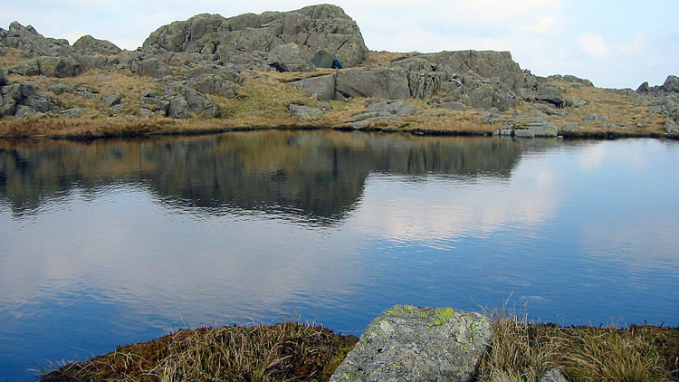 Tent pitch by Little Stand summit tarn