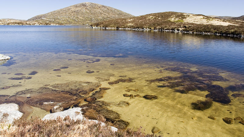 Mullwharchar with light patterns and boulders in Loch Enoch
