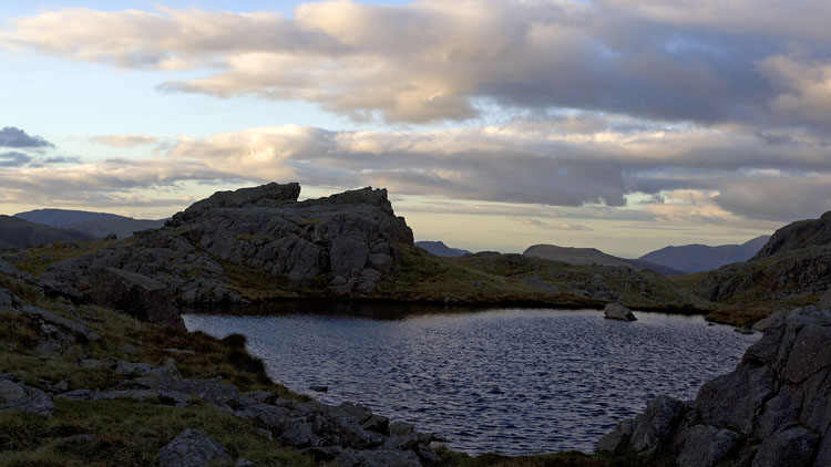 Evening sky & light on High House Tarn from the pitch Evening sky & light on High House Tarn from the pitch