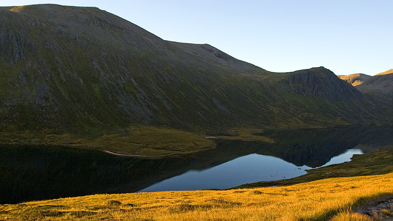 Dawn light and reflection in Loch Avon Dawn light and reflection in Loch Avon