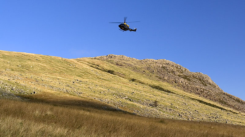 Helicopter cruising the cwm