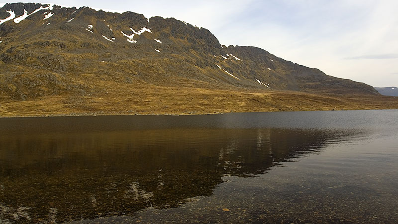 Northern cliffs of Ben Alder across Loch a' Bhealaich Bheithe Northern cliffs of Ben Alder across Loch a' Bhealaich Bheithe